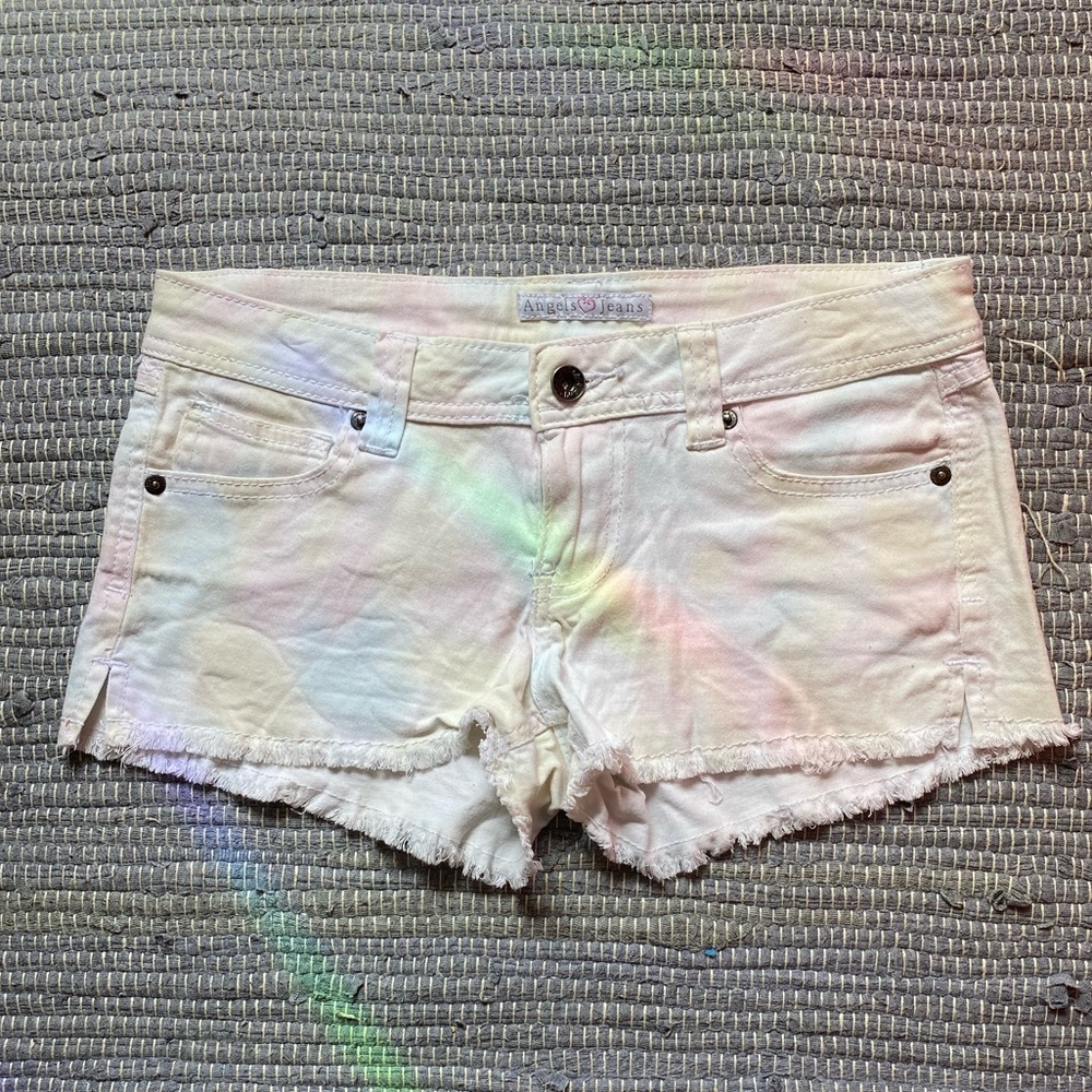 White jean shorts with slight rainbow color